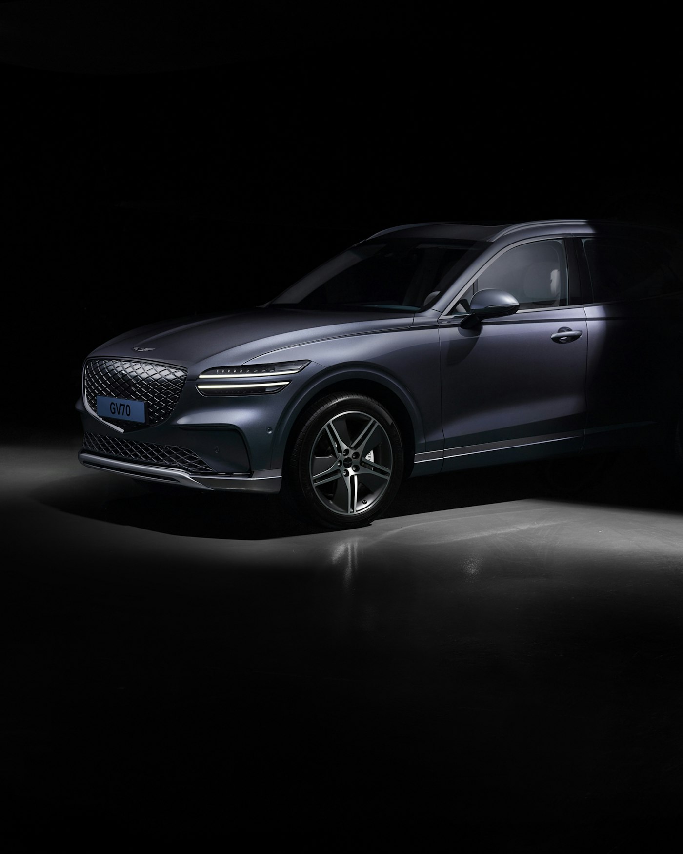Electric SUV under studio light after coating