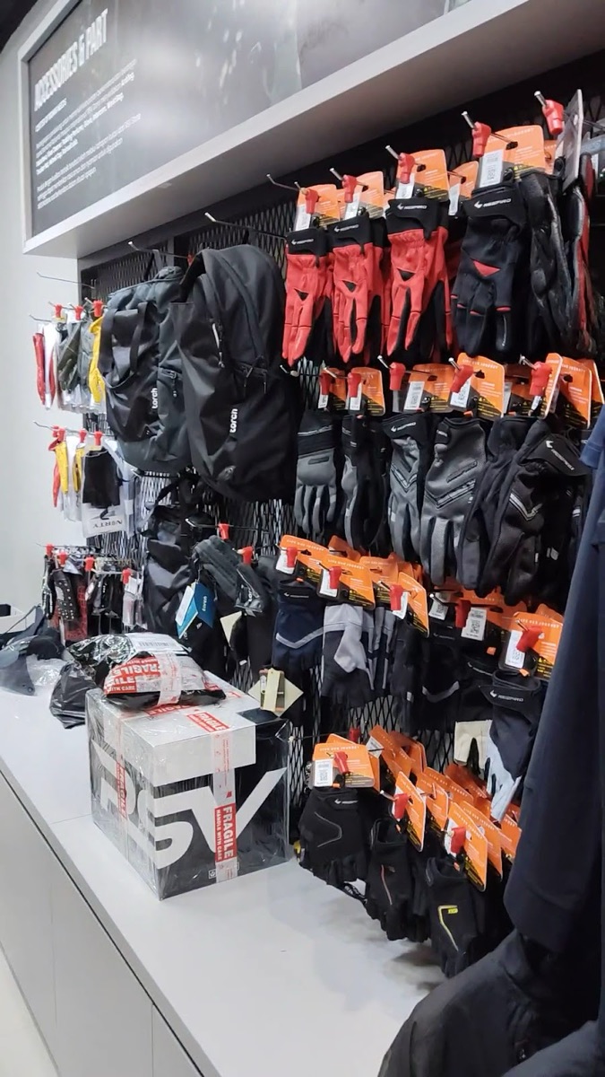 Gloves and accessories wall at RSV Store Serpong